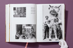 Interior spread with black-and-white photographs and a figure in an elaborate dress — Frida Kahlo.