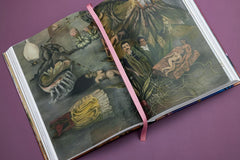 Angled interior view of richly detailed painted compositions — Frida Kahlo.
