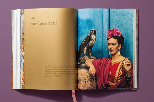 Interior spread featuring a self-portrait with a bird — Frida Kahlo.