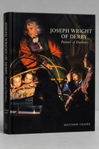 Front cover with a candlelit group studying a scientific instrument — Joseph Wright of Derby: Painter of Darkness.