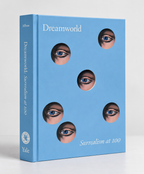 Blue front cover with floating eyes and Surrealism at 100 subtitle — Dreamworld: Surrealism at 100.